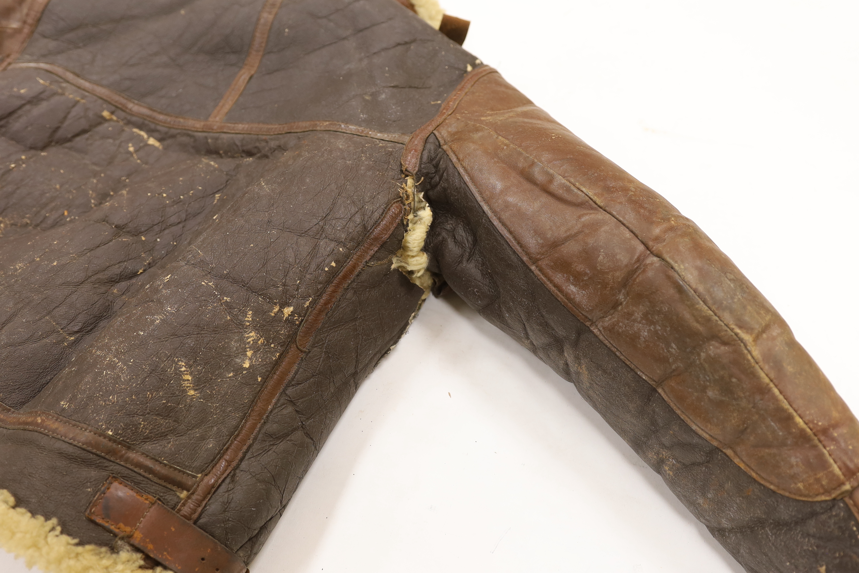 A United States Air Force Type B-3 sheepskin flying jacket, with label to collar reading; ‘Type B-3 DWG. No.33H5595 AC Order No.43-13609-AF Size 38R Property Air Force U.S. Army’